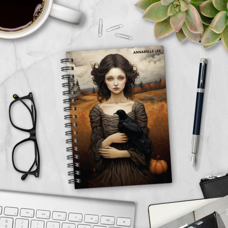 Personalized hardcover notebook in Raven's Girl design with a Victorian girl holding a black raven in autumn field with church and pumpkin