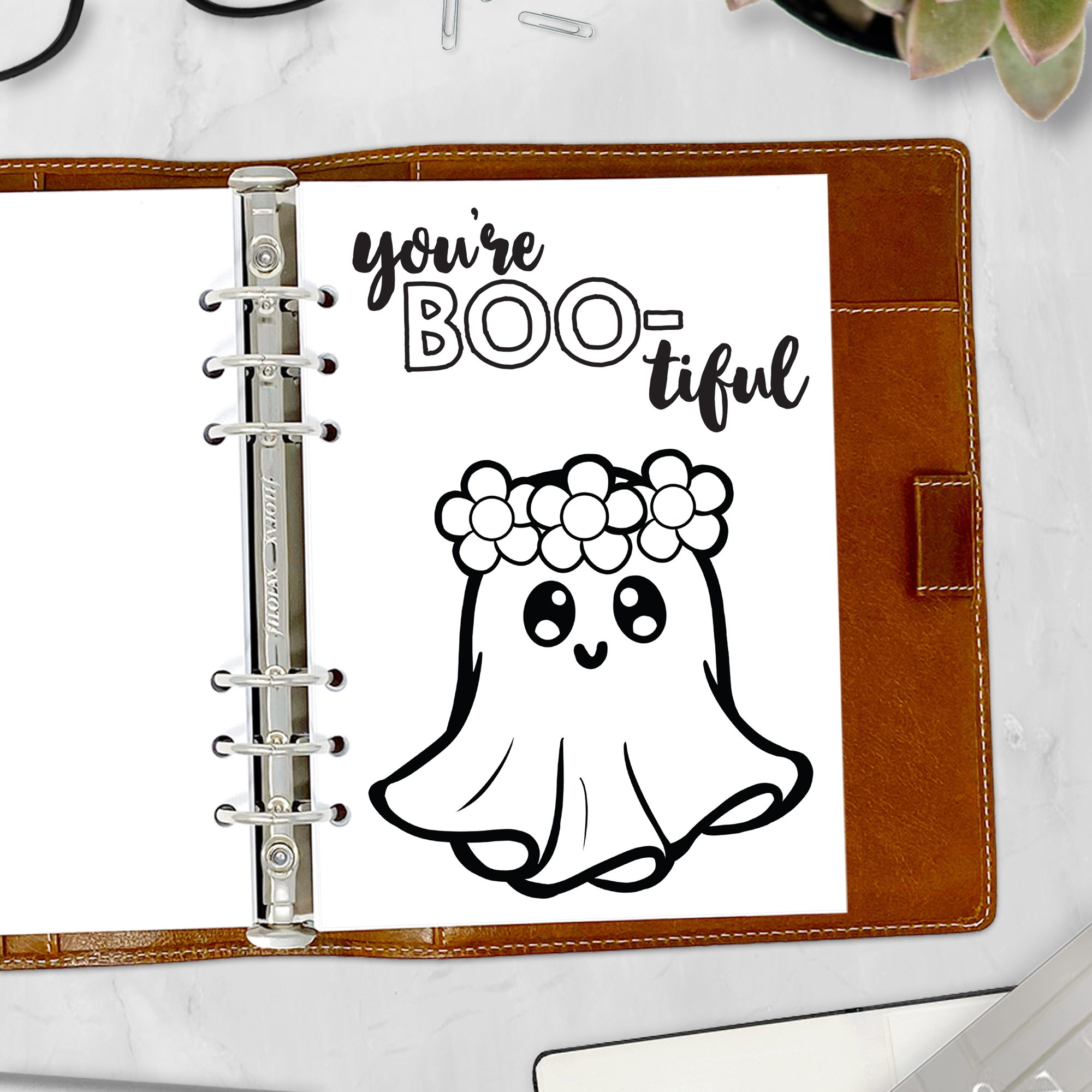 Halloween-themed insert with witchy illustrations for planners