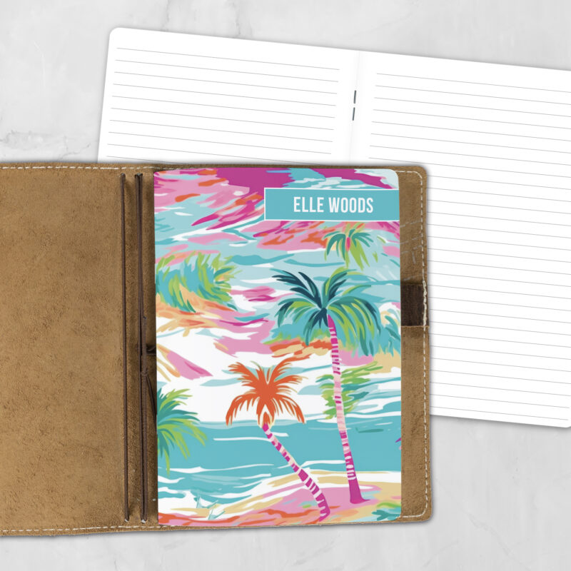 A5 Aquarelle Sky personalized traveler's notebook refill showing the cover design inside a leather traveler's notebook cover, with lined refill pages visible behind.