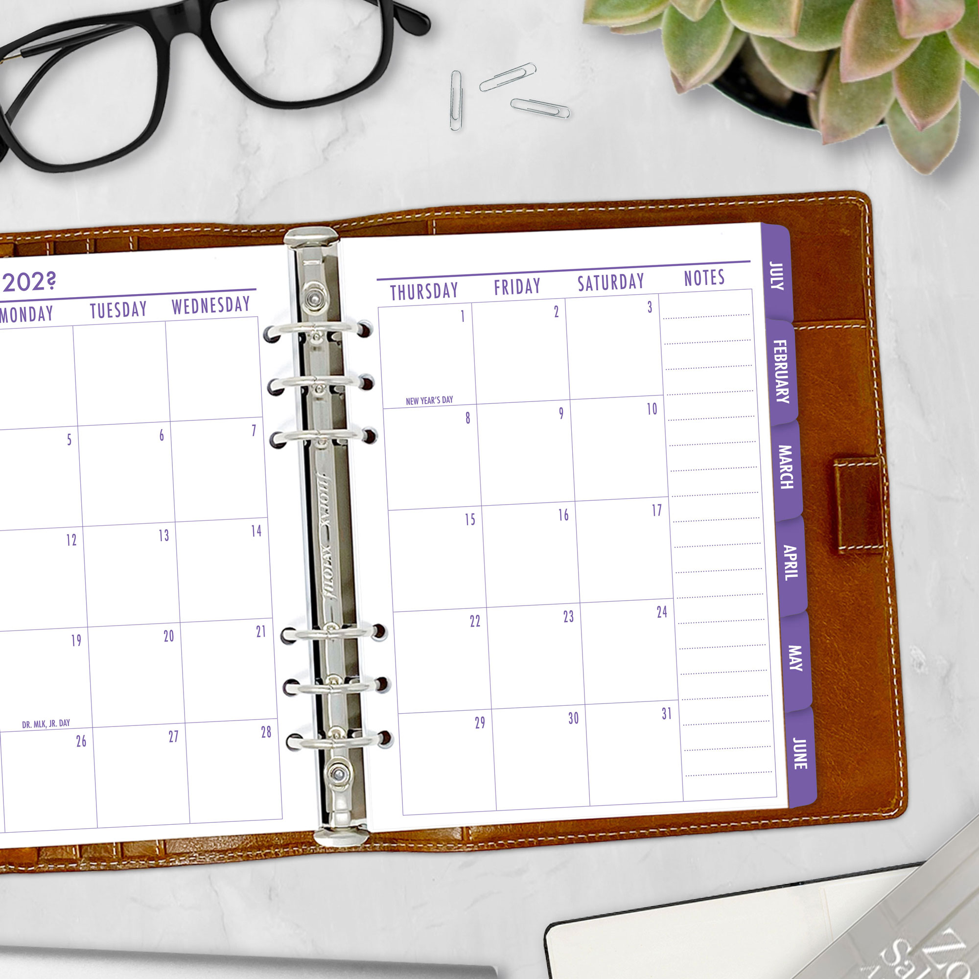 Month on 2 Pages planner insert in Amethyst Twilight design with colorful tabs in A5 size in brown ring binder