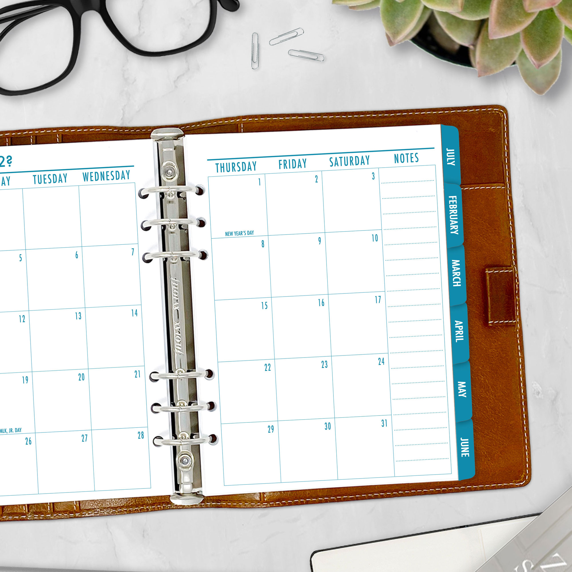 Month on 2 Pages planner insert in Midnight Sea design with colorful tabs in A5 size in brown ring binder