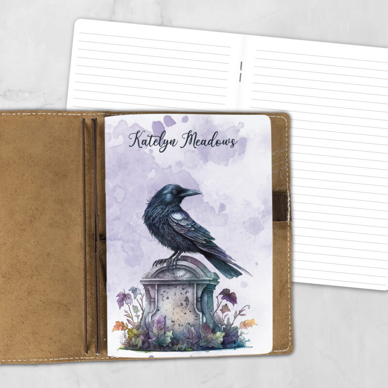A5 Nevermore personalized traveler's notebook refill showing the cover design inside a leather traveler's notebook cover, with lined refill pages visible behind.