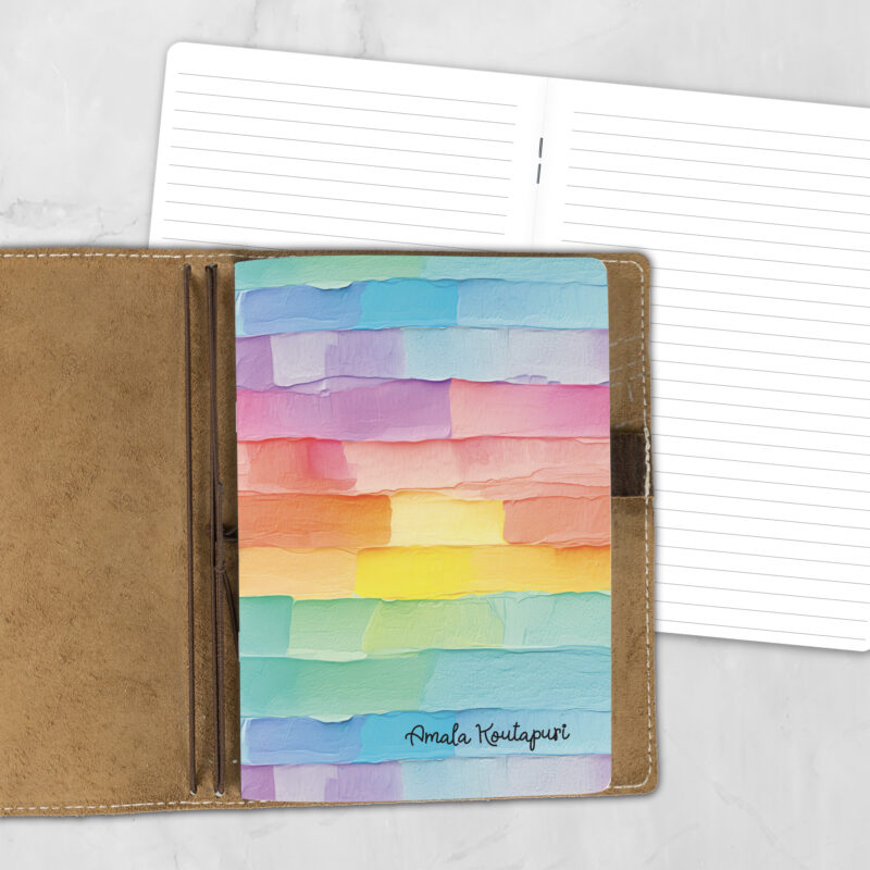 A5 Palette Cake personalized traveler's notebook refill showing the cover design inside a leather traveler's notebook cover, with lined refill pages visible behind.