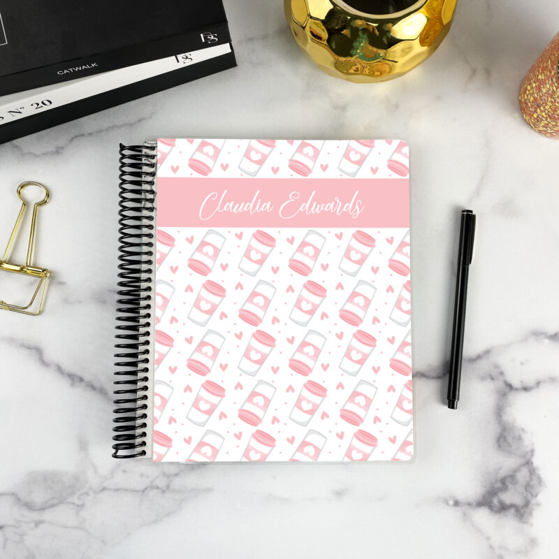 7x9 spiral bound planner in the Caffeine Crush cover design on a marble surface with styling accessories.