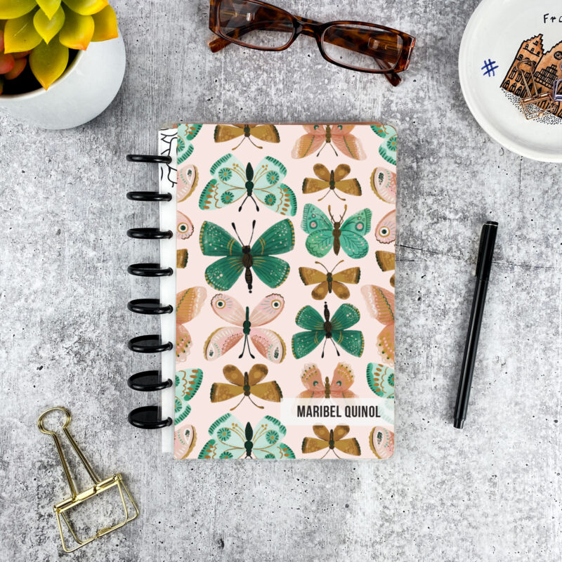 Personalized disc bound password book in green and brown butterflies pattern with laminated cover, black discs, and custom name
