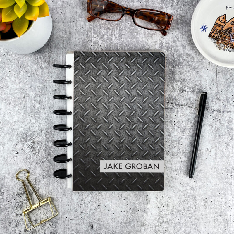 Personalized disc bound address book in Industrial Strength pattern with laminated cover and custom name