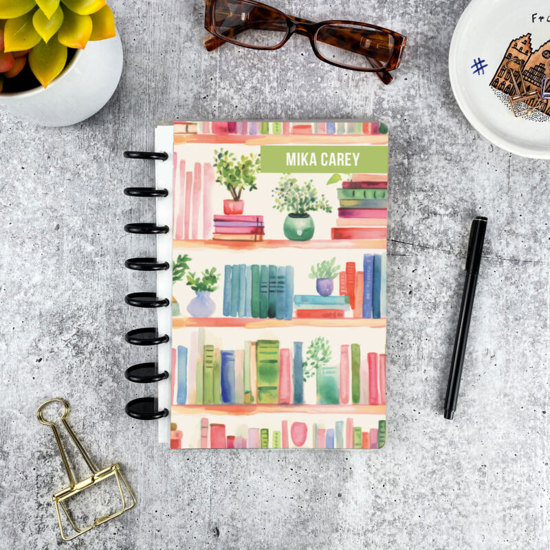 Personalized disc bound address book in bookshelf pattern with laminated cover and custom name